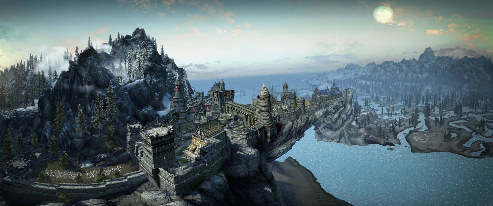 Medieval castle on snowy mountain cliff overlooking frozen lake at dusk.