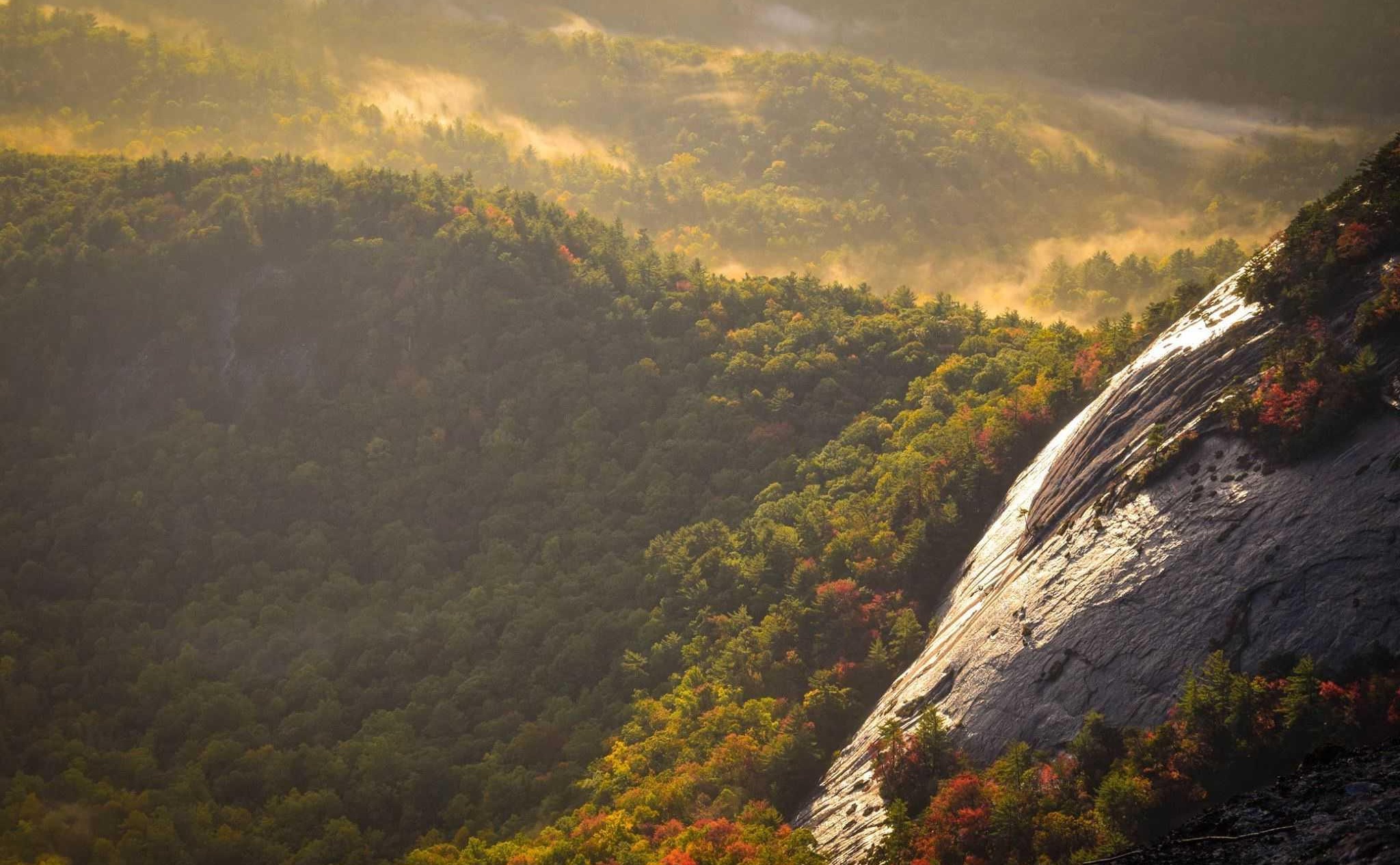 Ancient stone cliffs overlooking a winding river valley