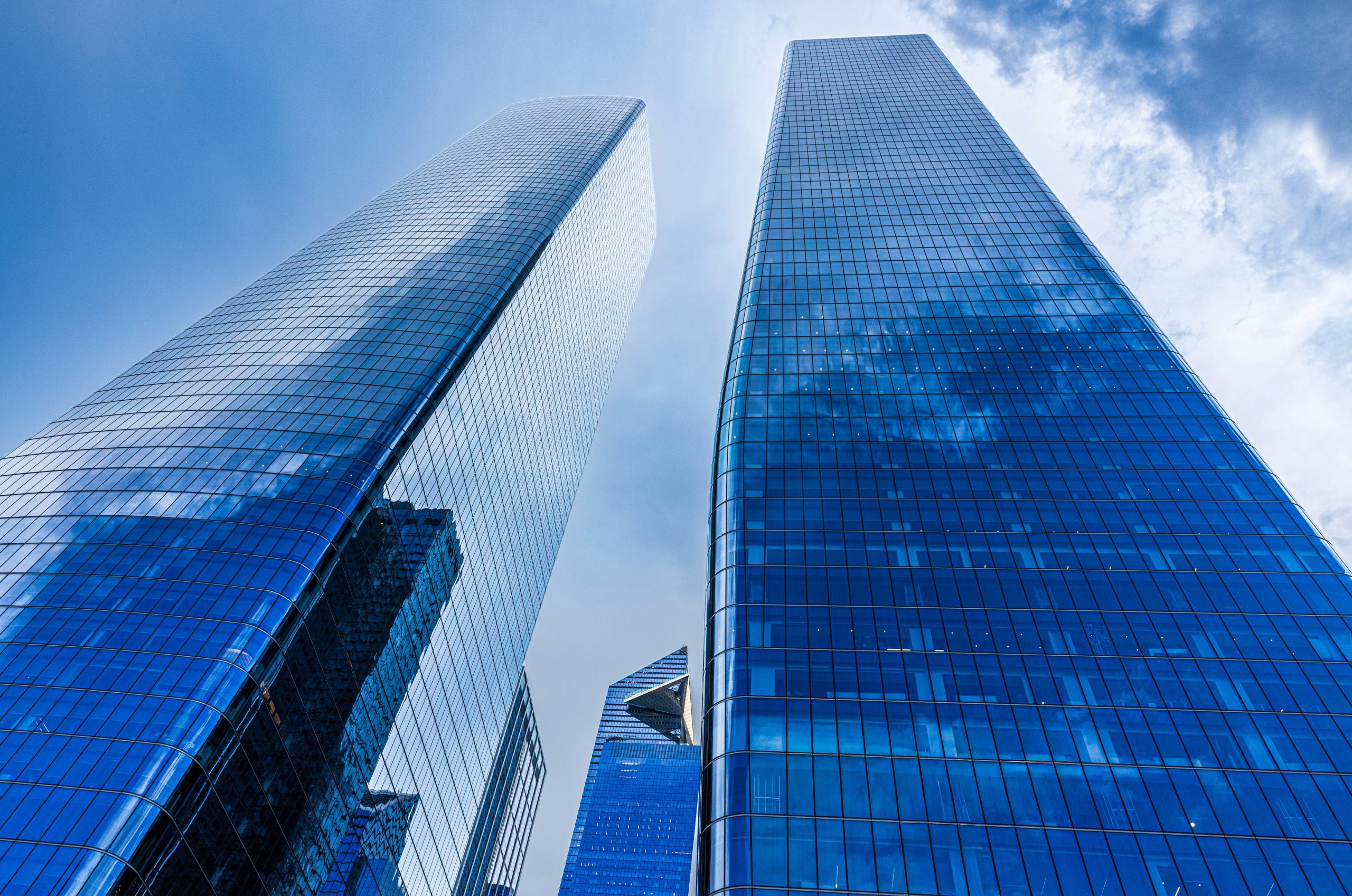 Whispered Two Tall Glass Skyscrapers