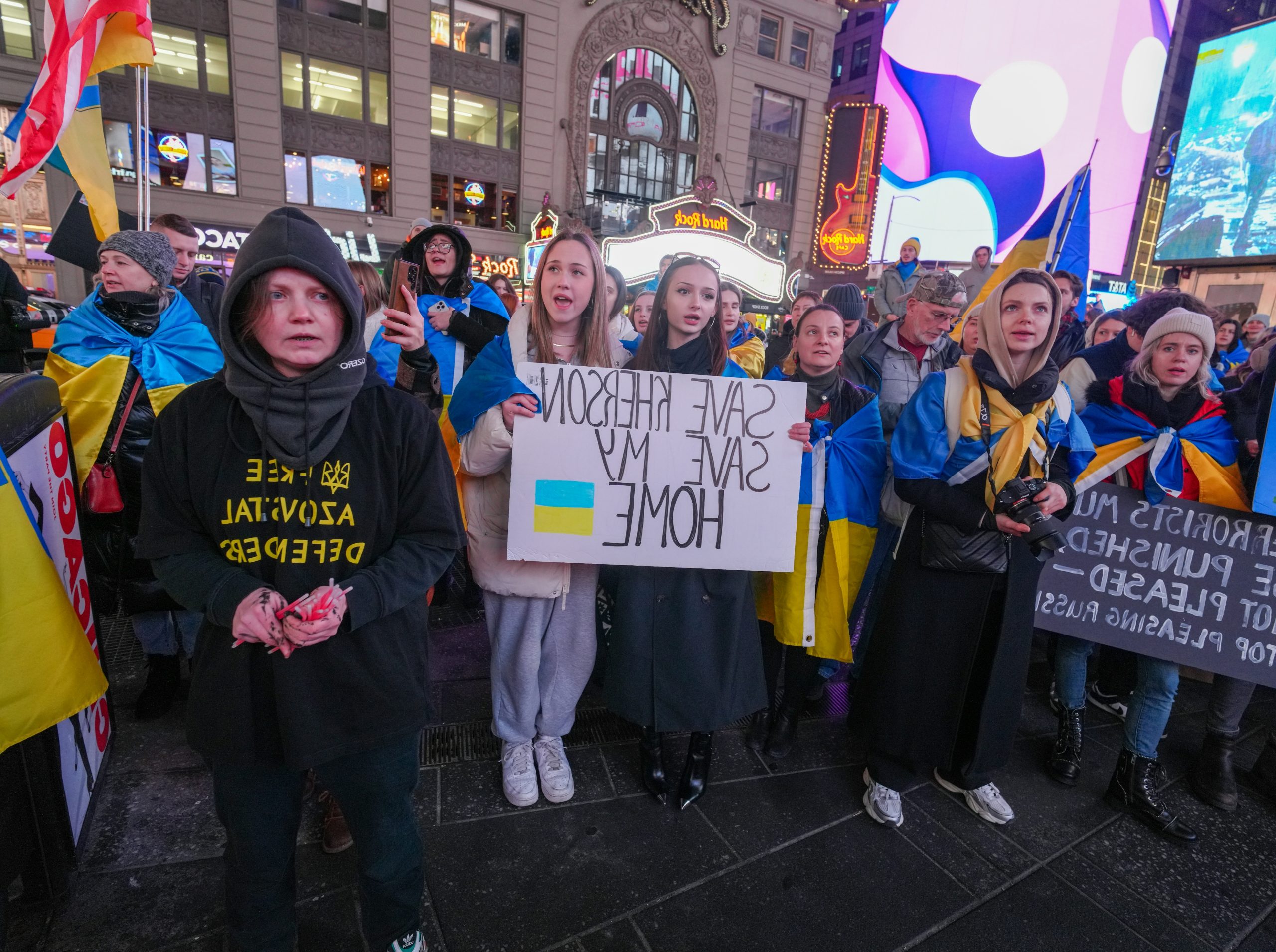 Delicate People Holding Ukrainian Flags