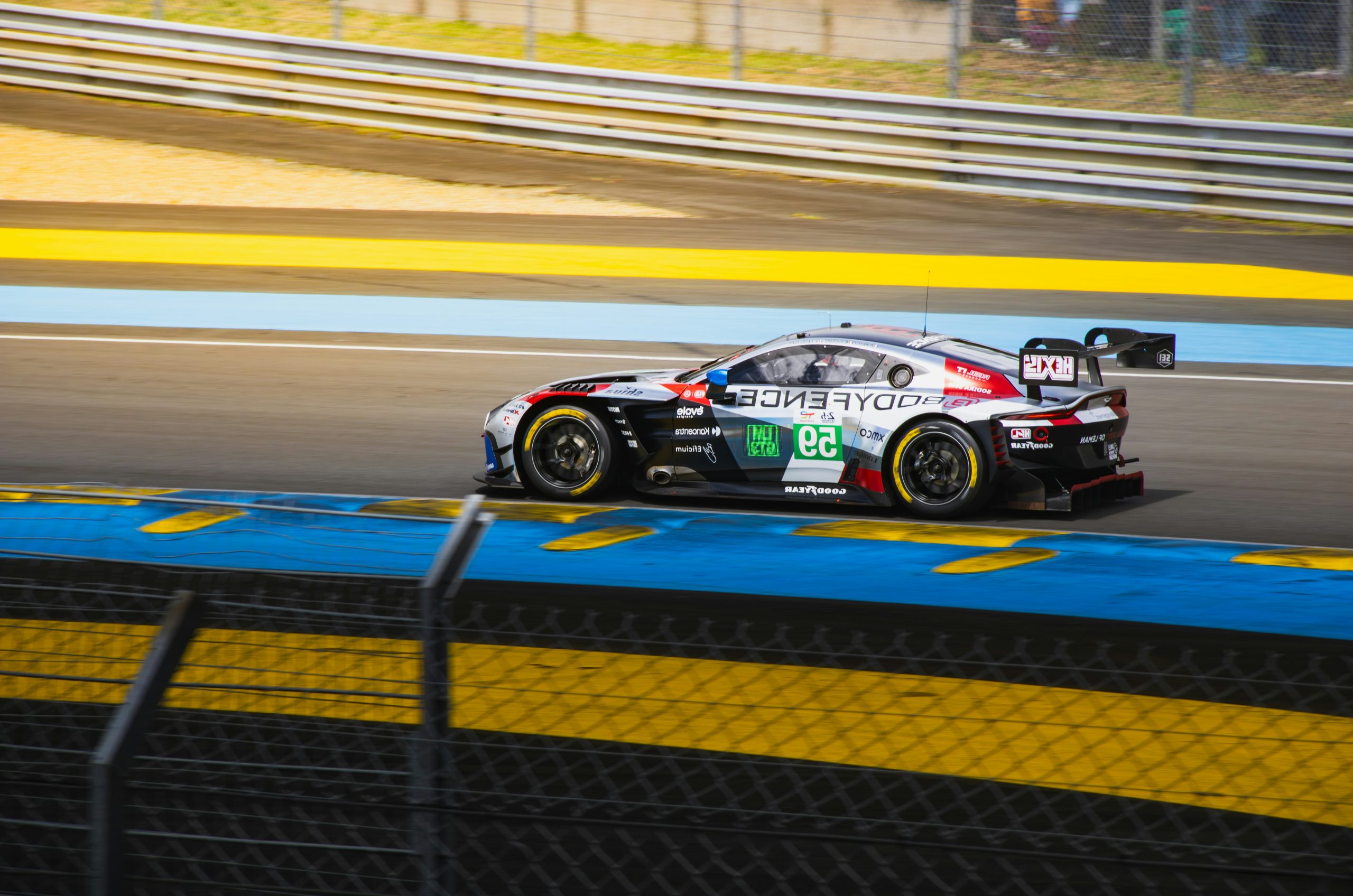 Azure Race Car Speeding Along