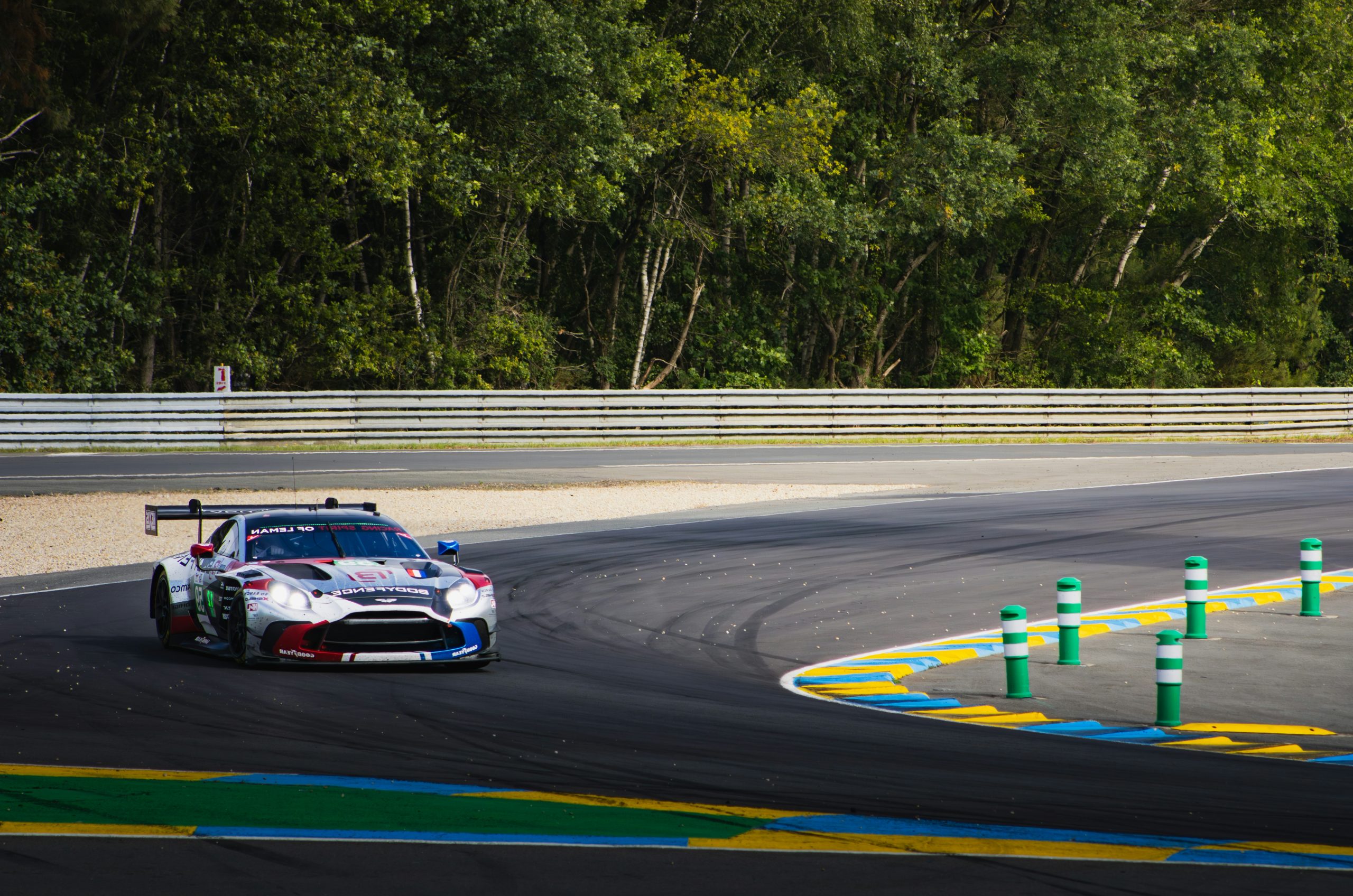 Cobalt Silver Race Car Cornering