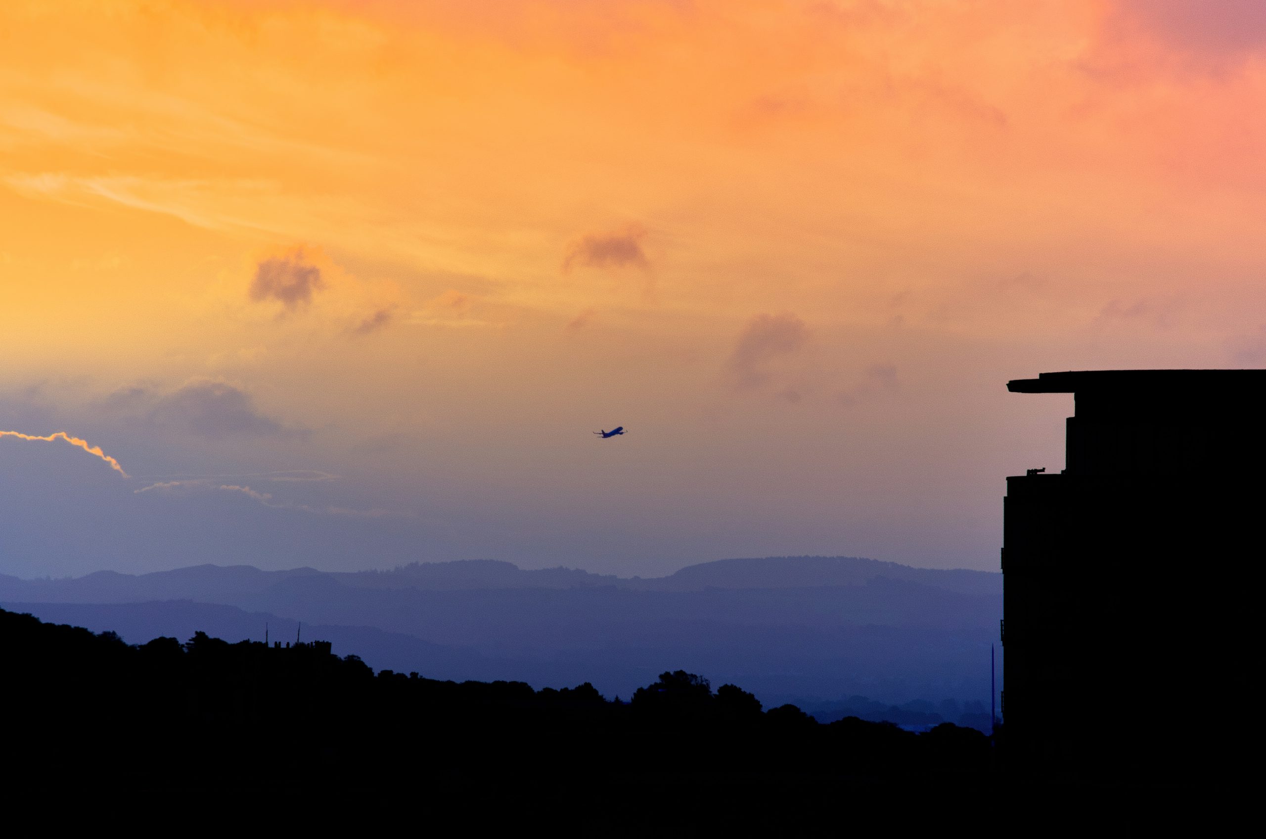 Crimson Distant Airplane Silhouette