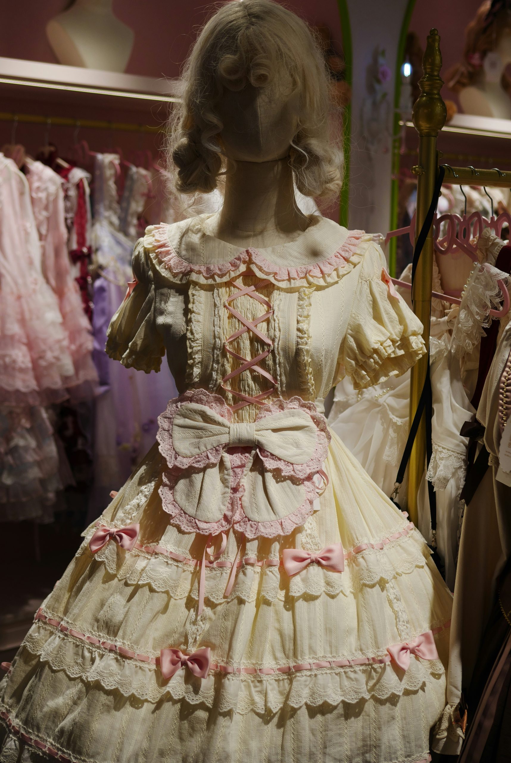 Emerald Mannequin Wearing A Cream