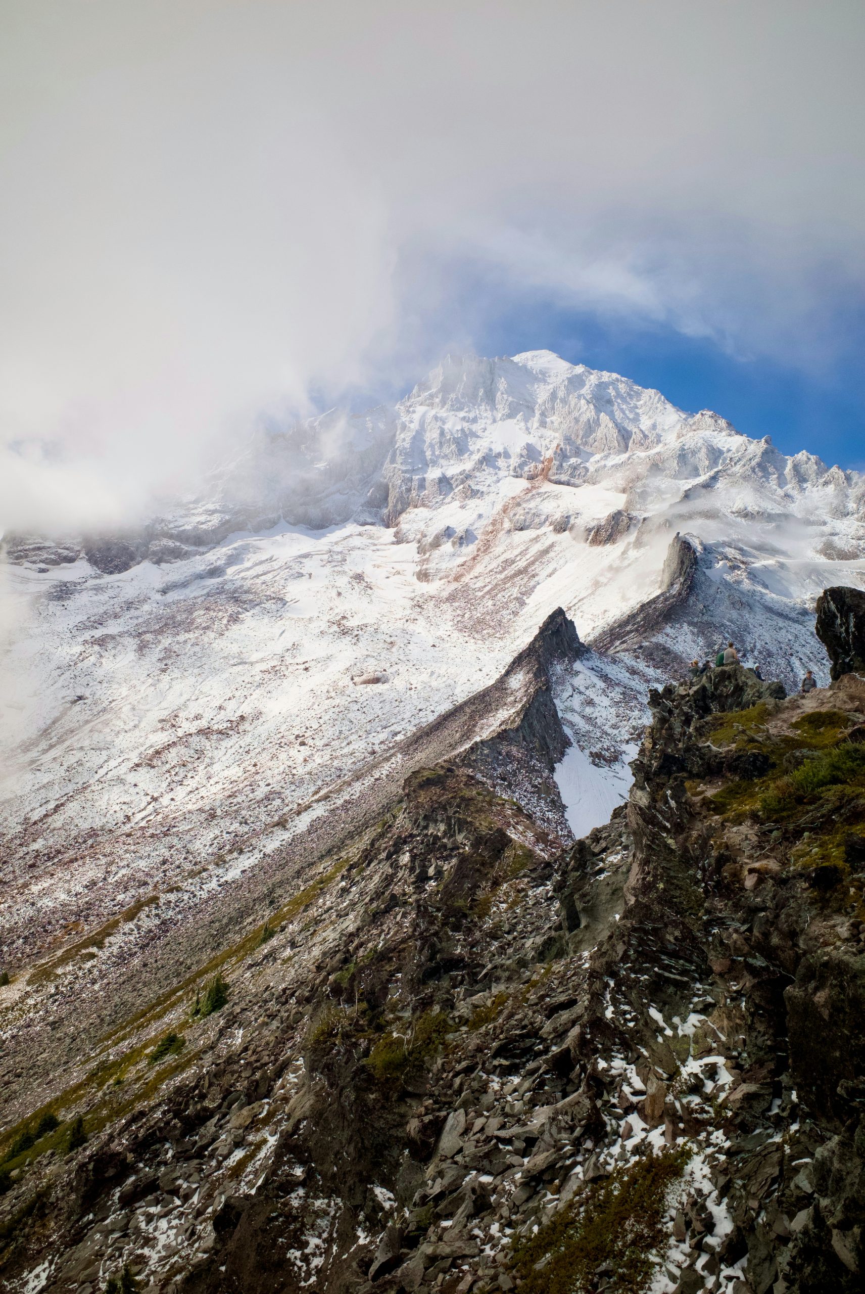 Emerald Snow-Covered Mountain Peak Rising