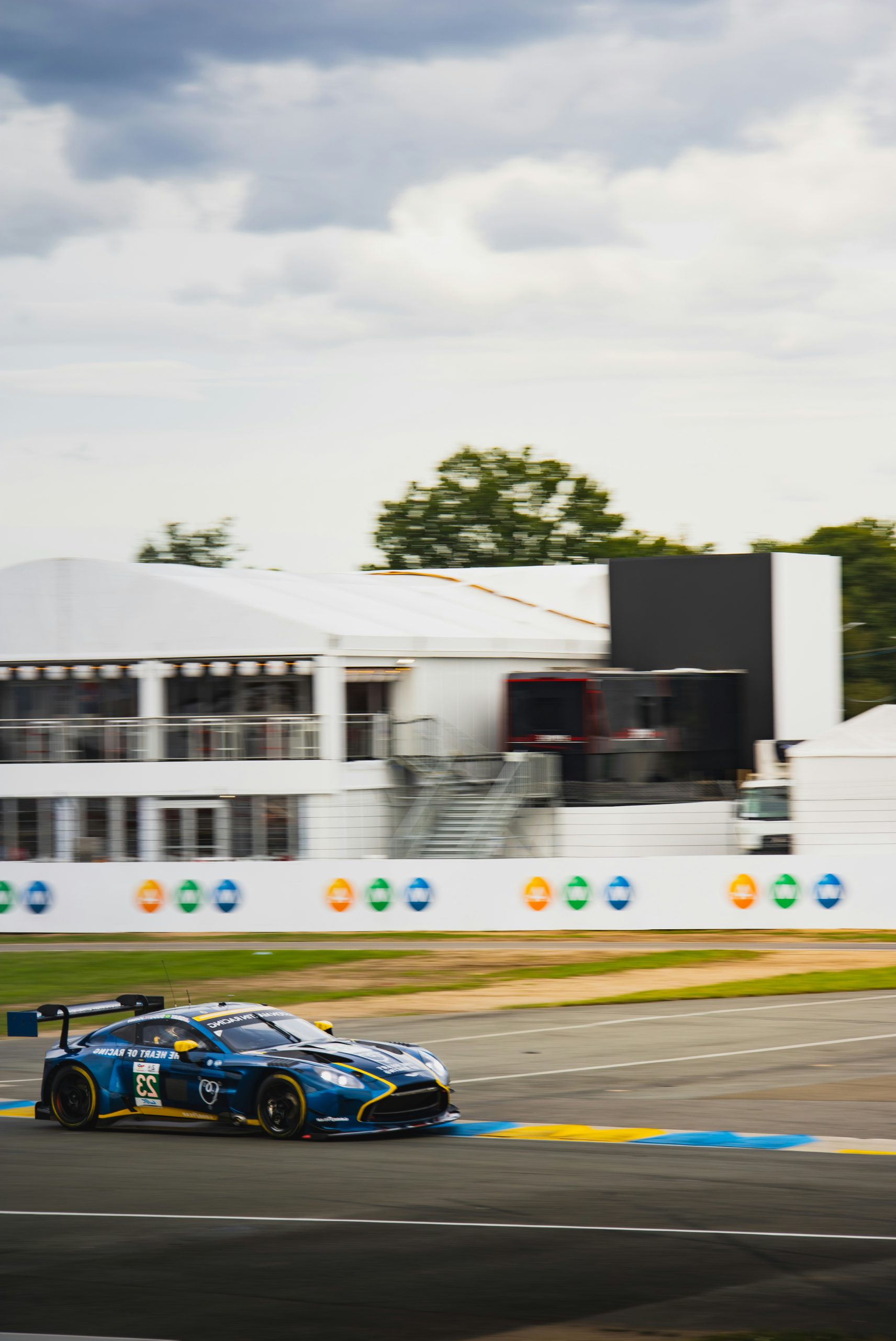Glowing Blue Race Car Speeding