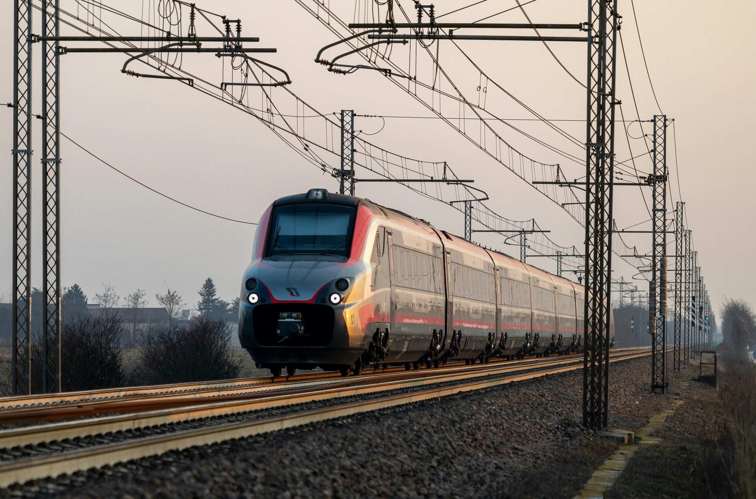 Glowing High-Speed Train Traveling Along