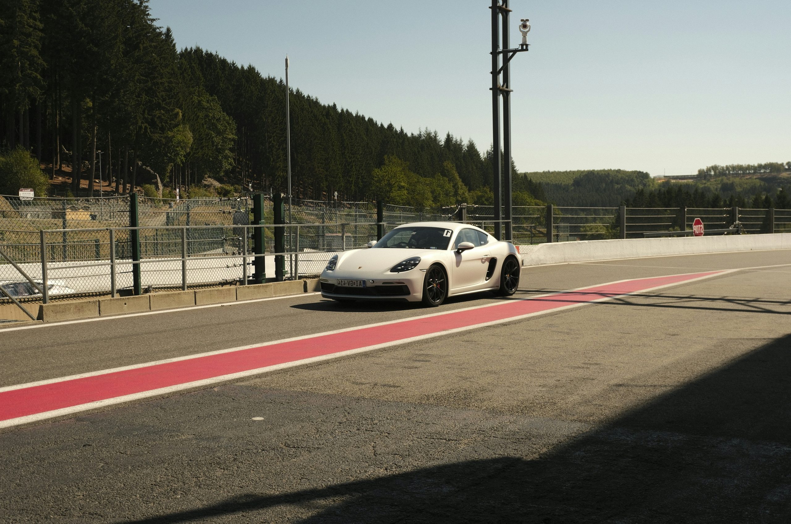 Ivory White Sports Car Driving