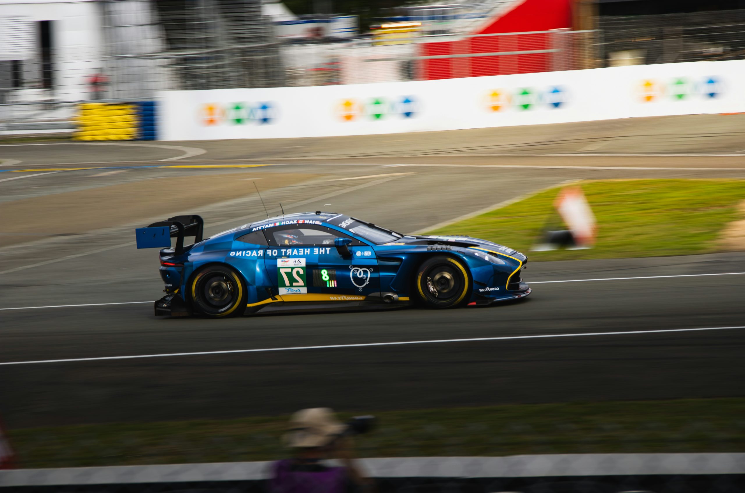 Prismatic Blue Race Car Speeding