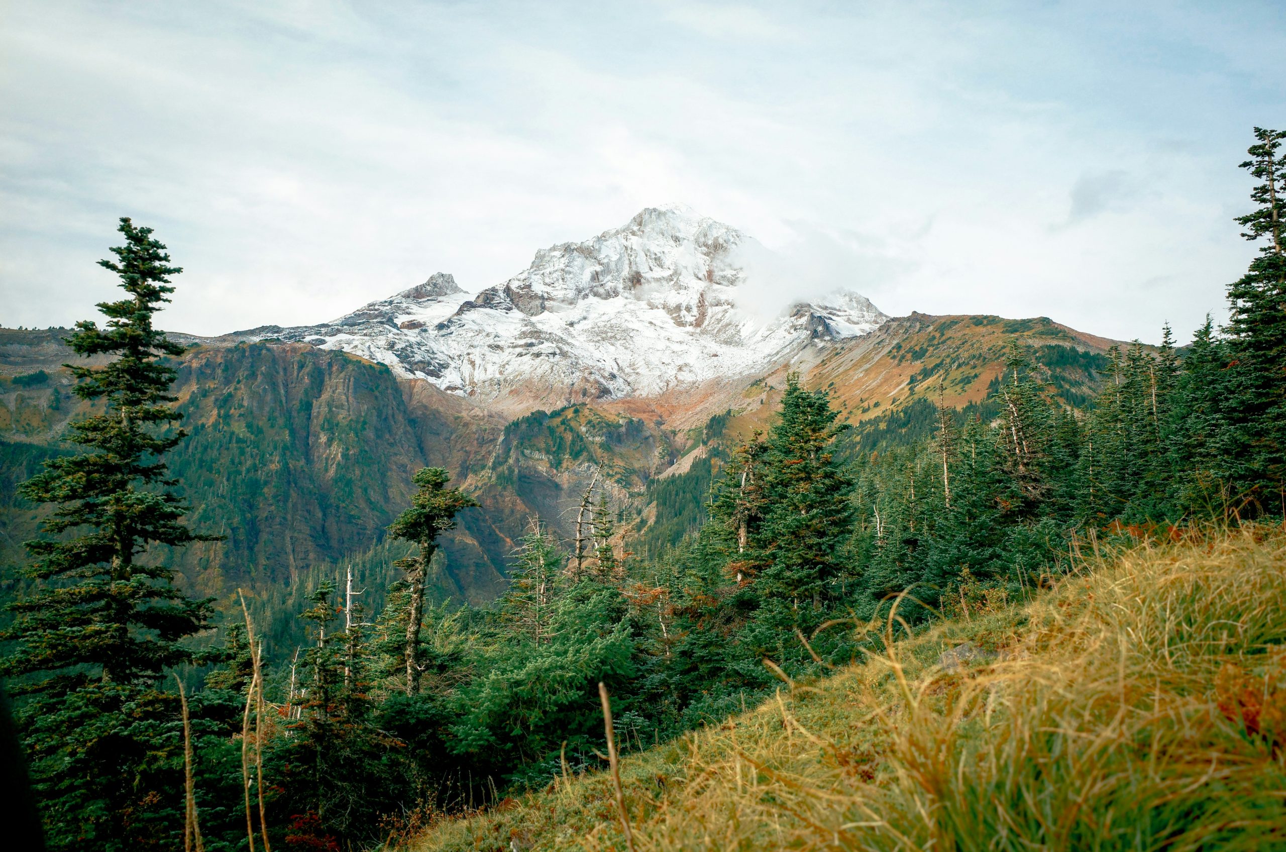 Prismatic Snow-Capped Mountain Peak Rising