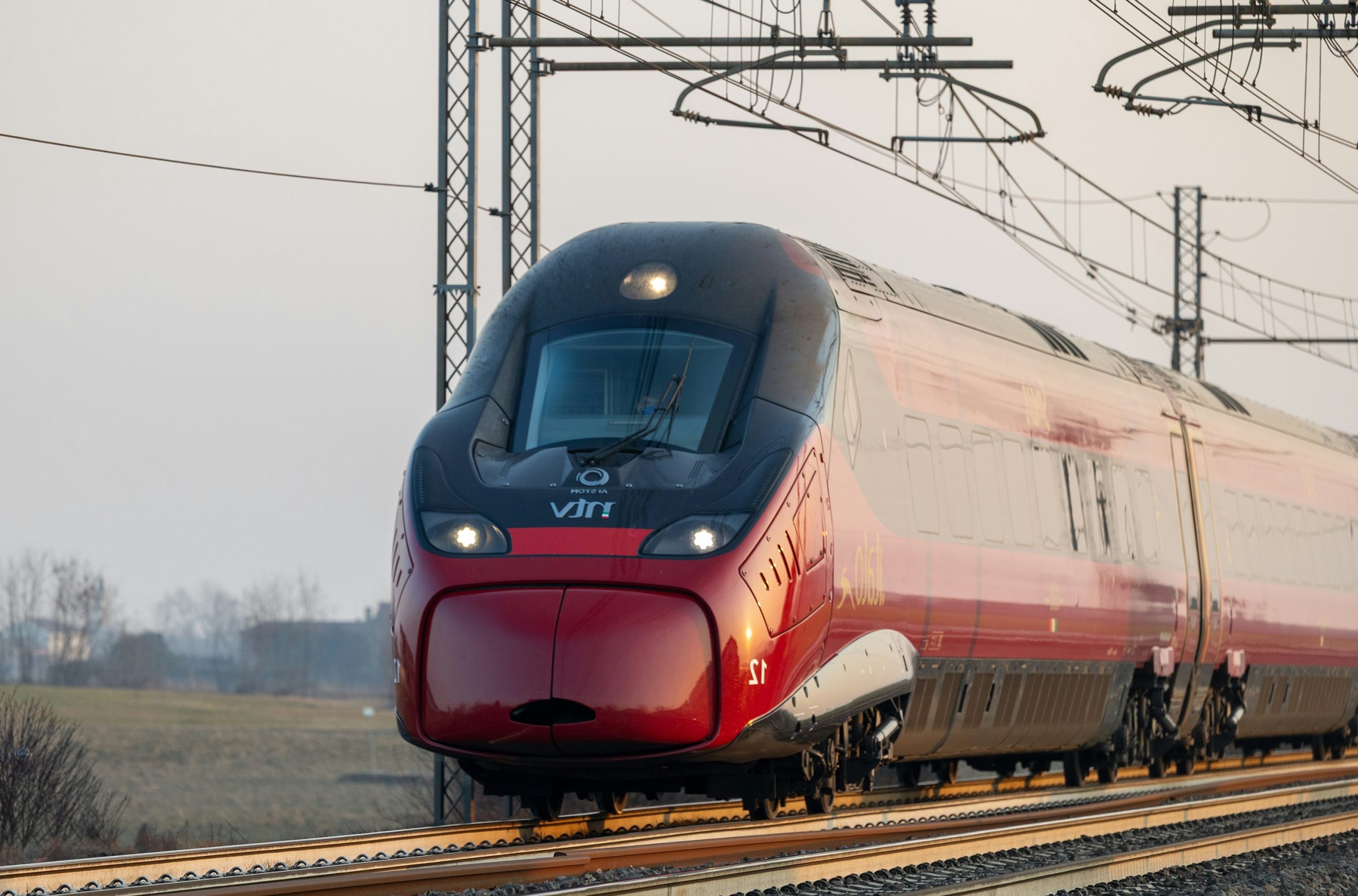 Radiant Red High-Speed Train Traveling