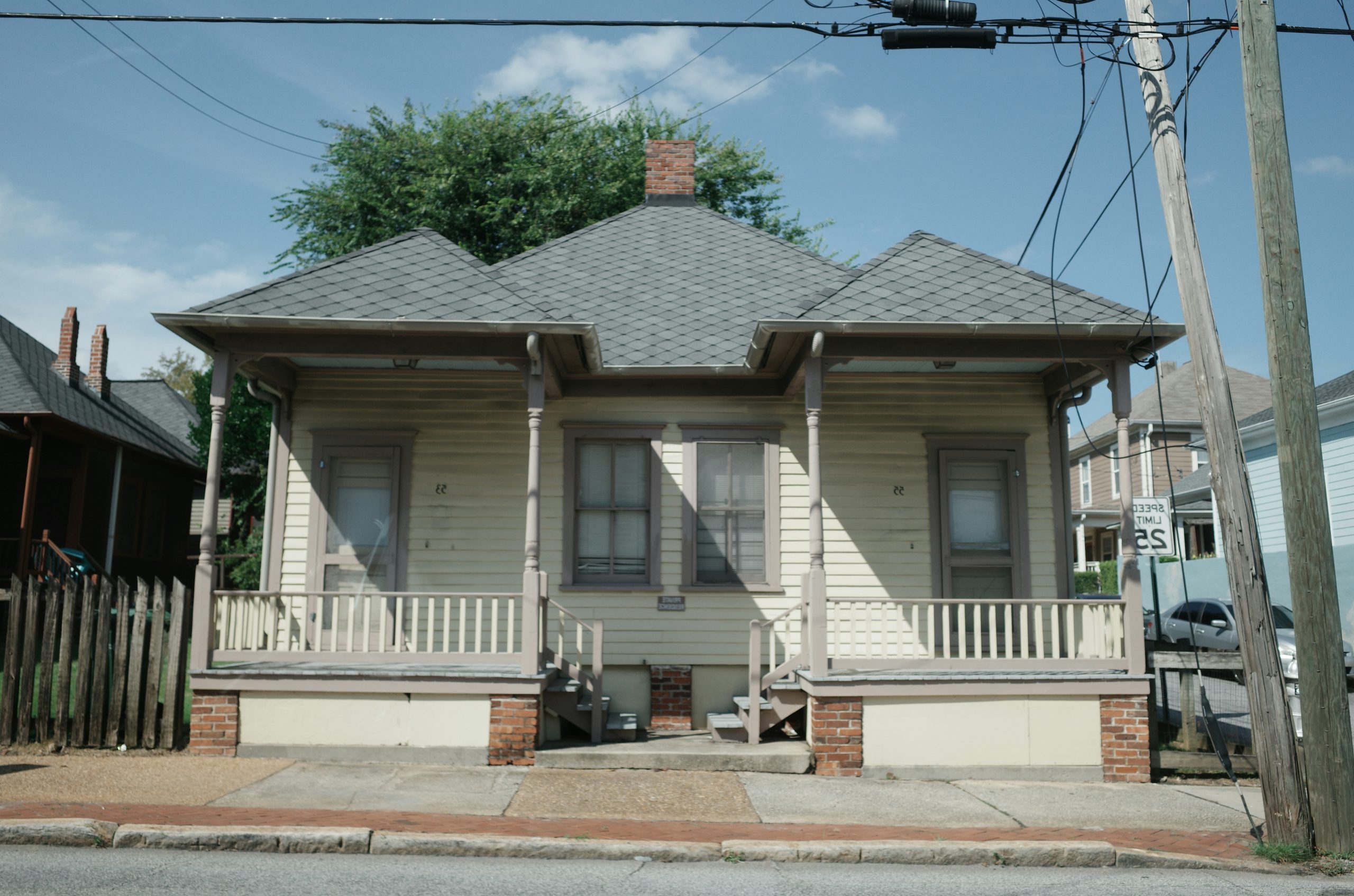 Sapphire Yellow Wooden Shotgun House