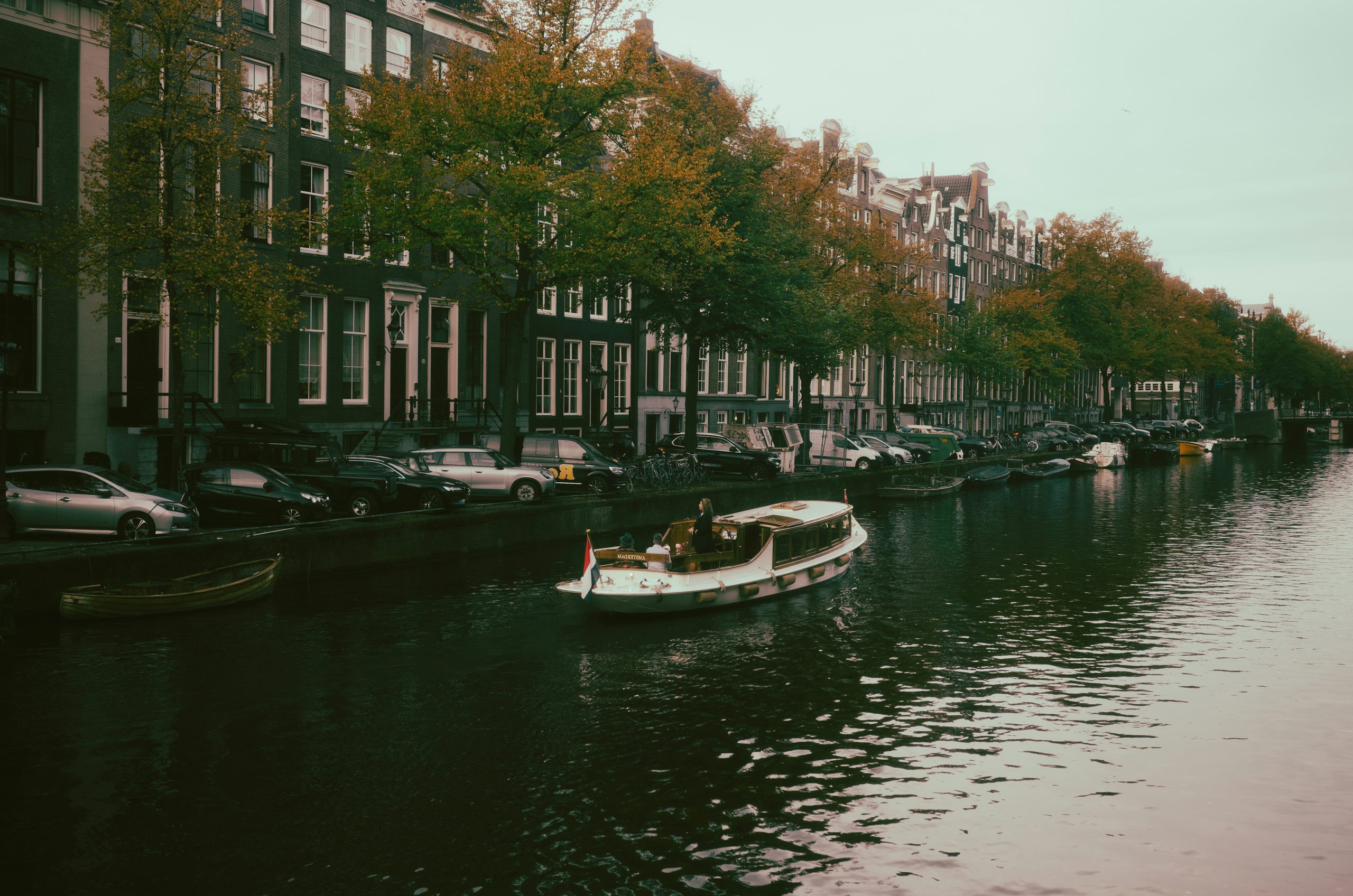 Sleek Canal Boat Cruising Past