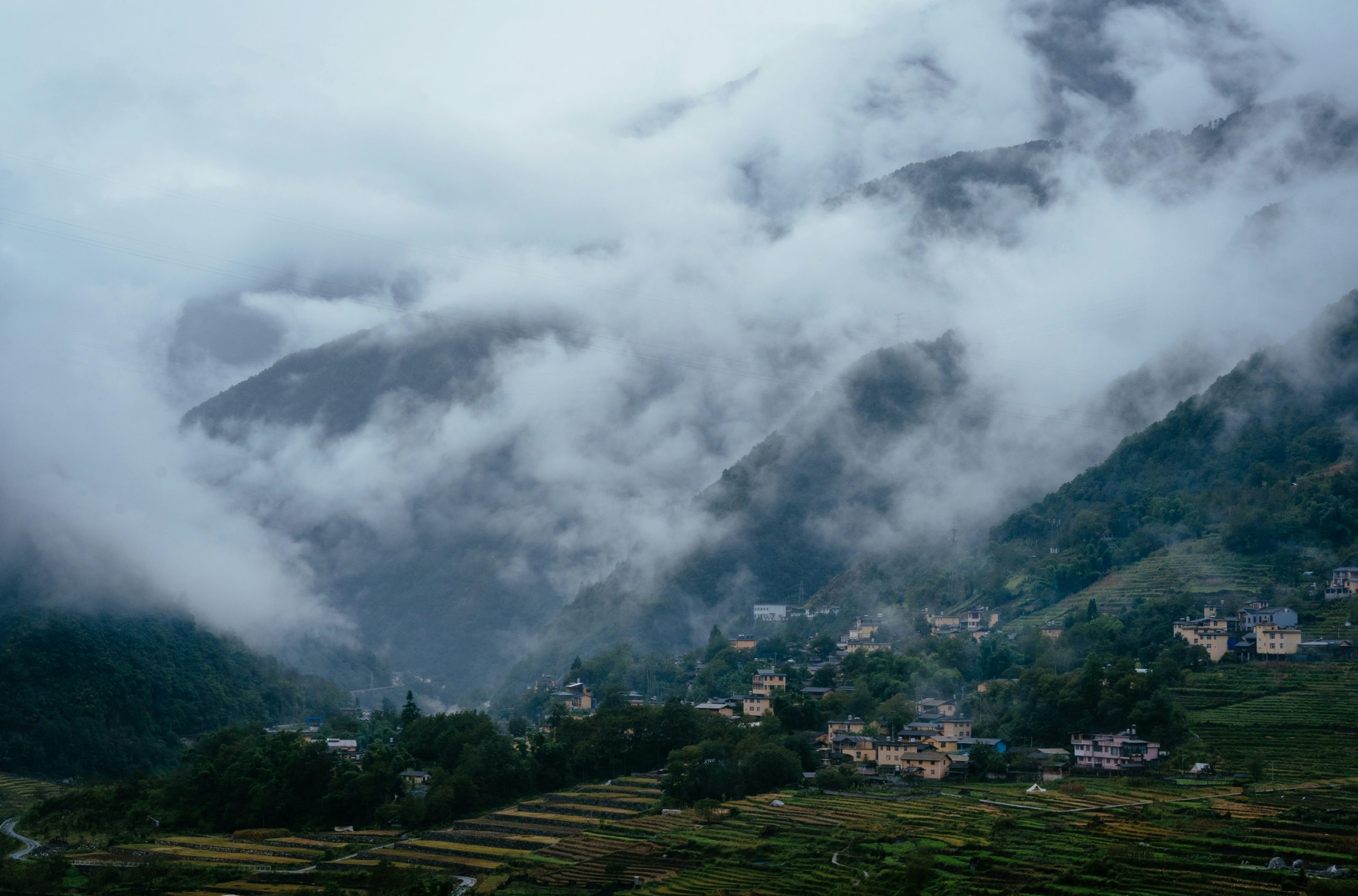 Smoldering Village Nestled Among Terraced
