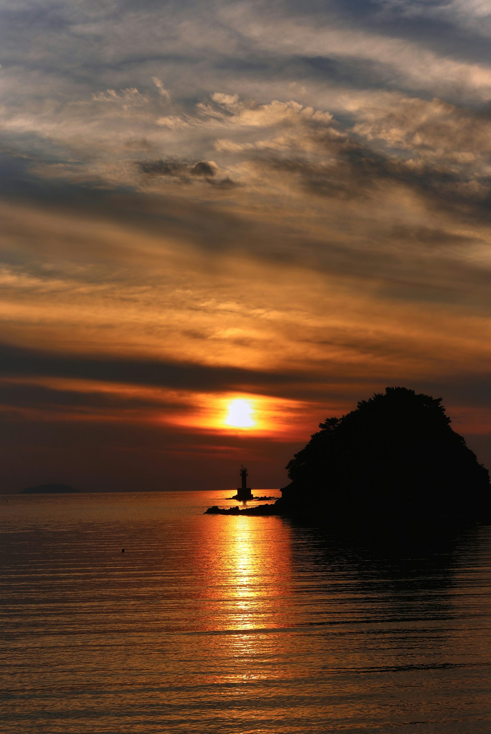 Sunlit Small Island Silhouette
