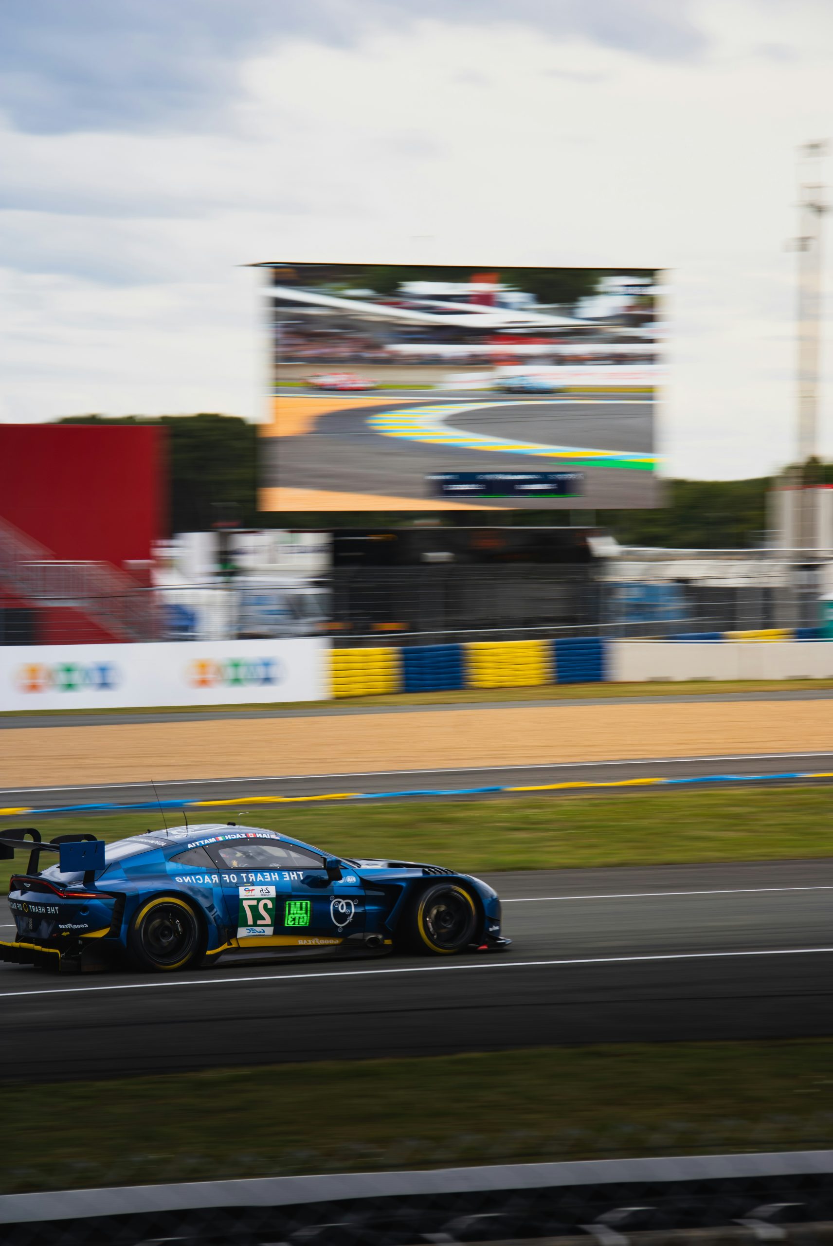 Velvet Blue Race Car Speeding