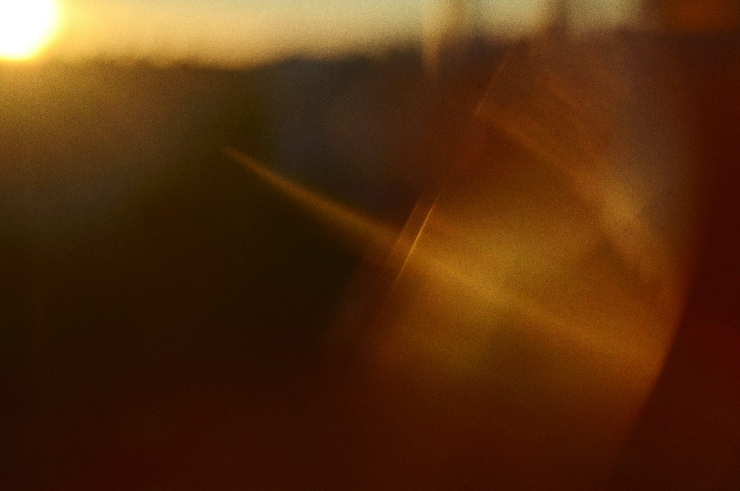 Vivid Abstract Golden Light Flares